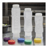 SET DE BOUCHONS COLORES ARAVEN dans FLACONS DOSEURS